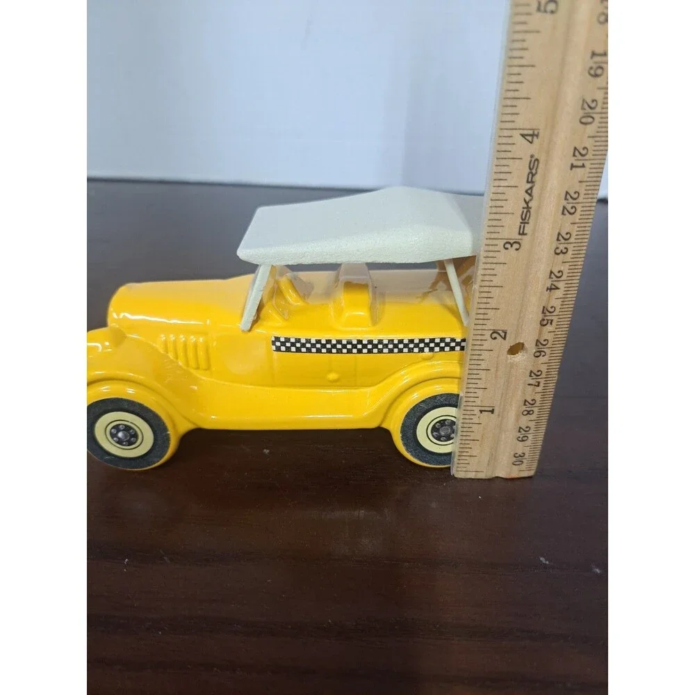 Vintage 1926 Yellow Checkered Cab Glass Avon Bottle